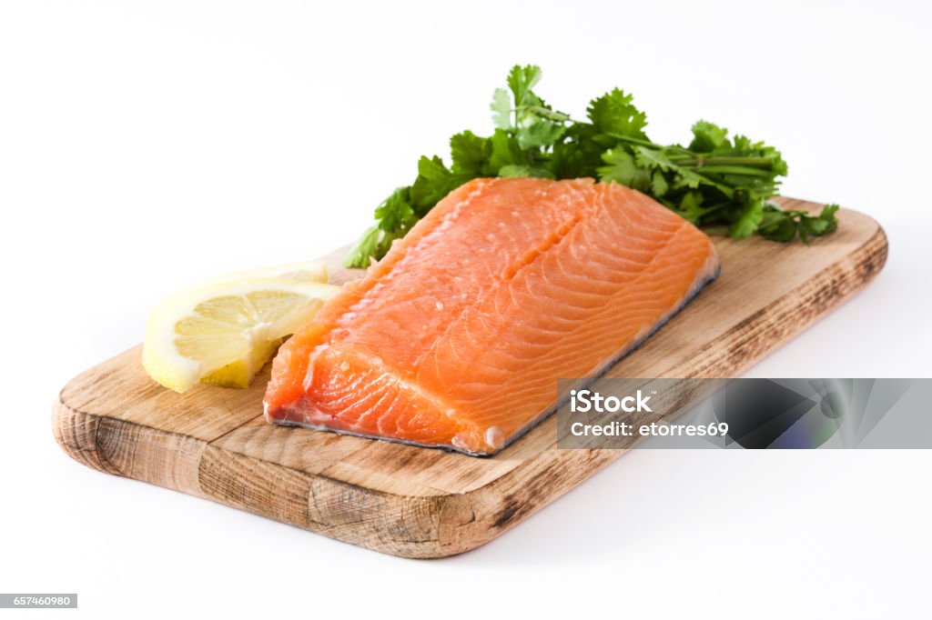 Raw salmon fillet Raw salmon fillet isolated on white background Salmon - Seafood Stock Photo