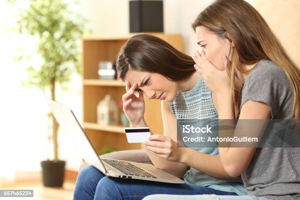 Worried Roommates Having Problems Buying Online Stock Photo - Download Image Now - Identity Theft, Child, Family