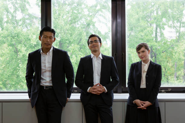 istock Business people standing on the windowsill 657474838