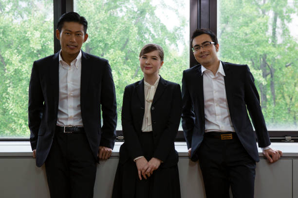 istock Business people standing on the windowsill 657474860