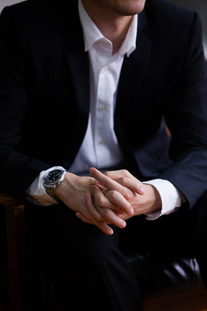 istock Businessman sitting to hear 657477604