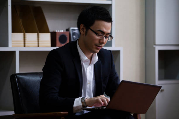 istock Businessman sitting to hear 657477740
