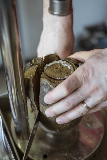 istock Civil engineer preparing a soil sample for a laboratory test in order to determine shear strength 657488542