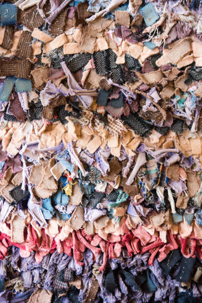 istock Old fashioned traditional oriental carpet with rags, as background 657489912