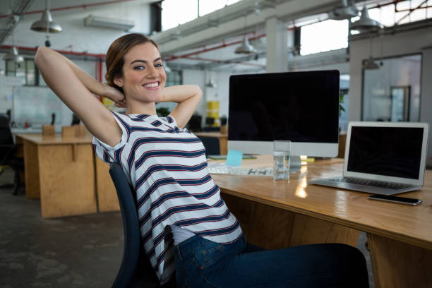 istock Female graphic designer relaxing on chair 657500846