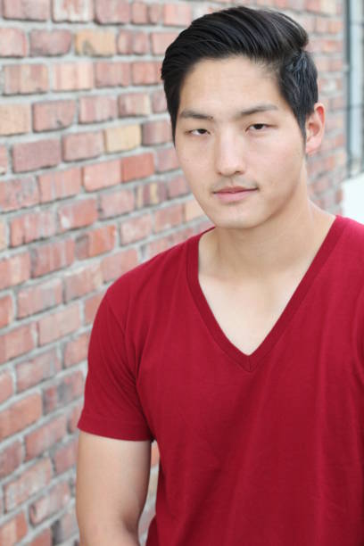 istock Confident Asian Man Portrait Isolated 657514192