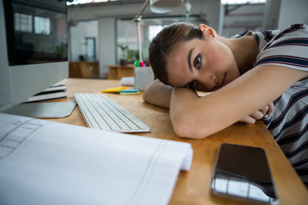 istock Overworked graphic designer sleeping on his desk 657517214