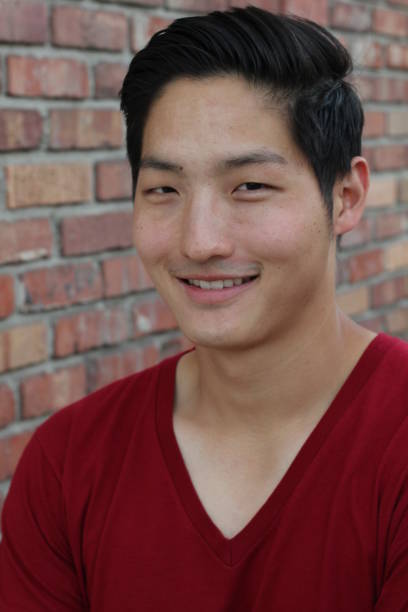 istock Asian man smiling and laughing 657517590