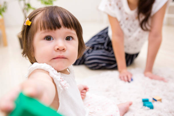 istock Girls play with toys 657520920