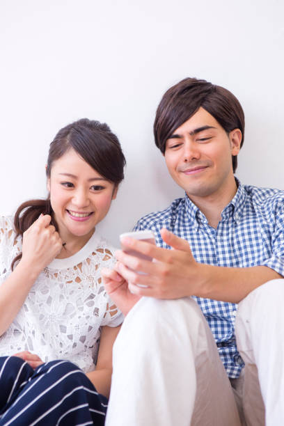 istock Men and women sit side by side 657524706