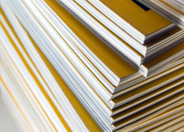 istock Stack of yellow monthly magazine 657527676