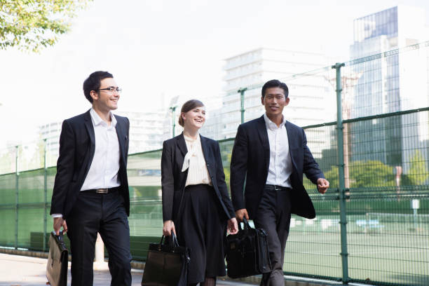 istock Business people through the Park 657531856