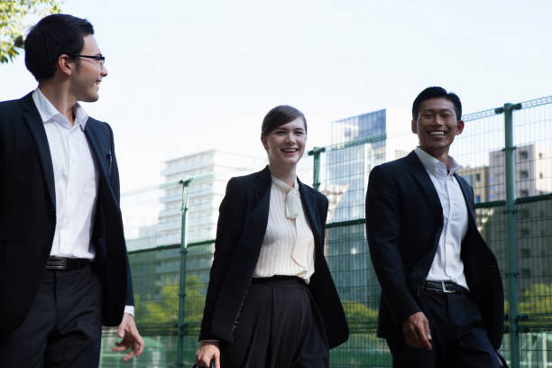 istock Business people through the Park 657531922