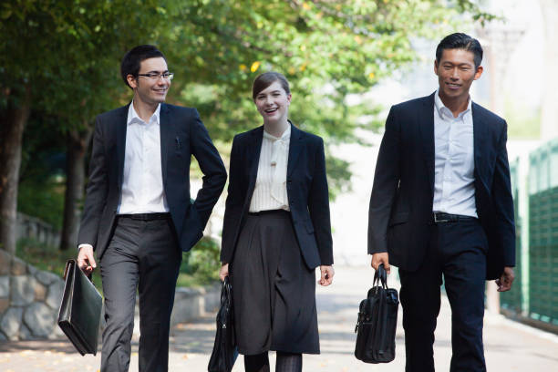 istock Business people through the Park 657531988