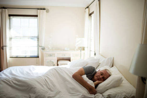istock Senior man sleeping in the bedroom 657533010