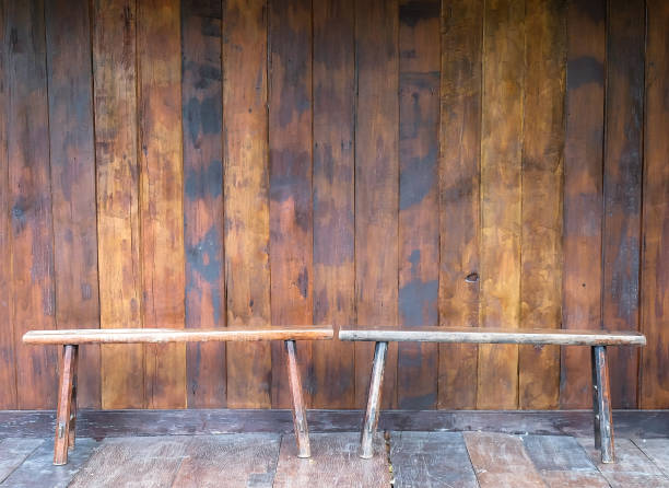 istock Wooden bench in a room with old wood 657533300