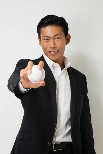istock Businessman with a baseball ball 657533424
