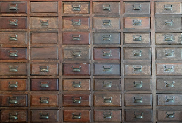 primitive wooden apothecary or catalog cabinet stock photo