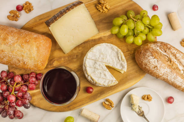 istock Red wine, cheese, bread and grapes at tasting 657536854