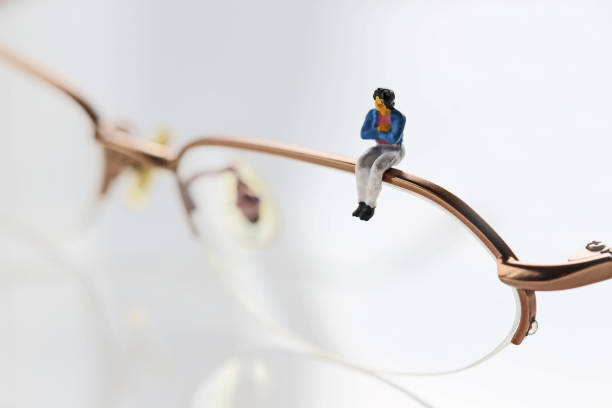 istock Women's glasses and miniature 657543602