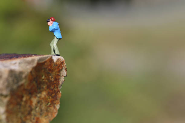 istock Miniature cliff of photographers 657546820