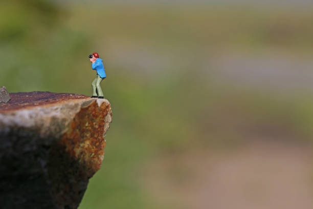 istock Miniature cliff of photographers 657546828