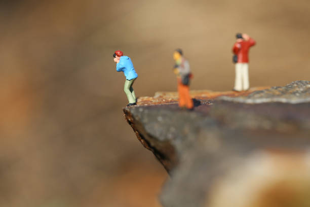 istock Miniature cliff of photographers 657547046