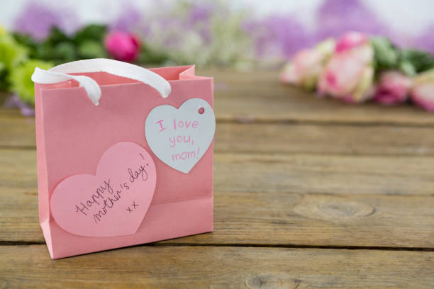 istock Pink gift bag with heart shape tag 657553914