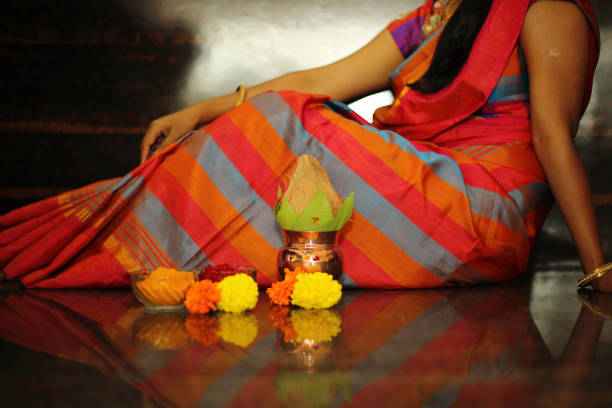 istock Hindu Woman Sitting on Floor 657563088