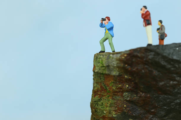istock Miniature cliff of photographers 657563112