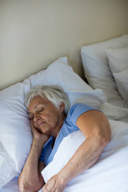 istock Senior woman sleeping in the bedroom 657563208