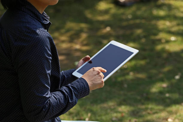istock Japanese women have the electronic Tablet 657564128