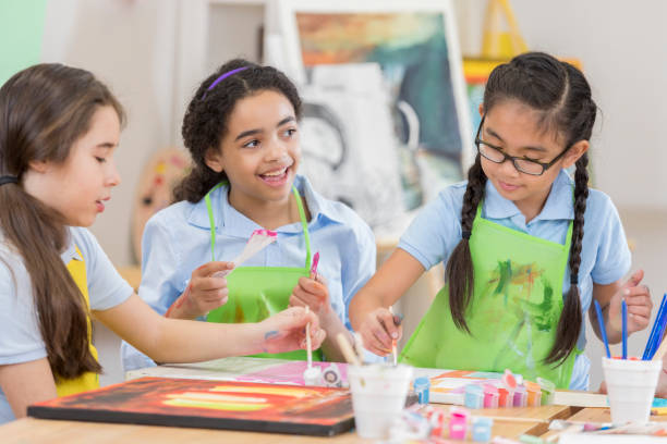 istock Diverse friends enjoy painting together 657565330
