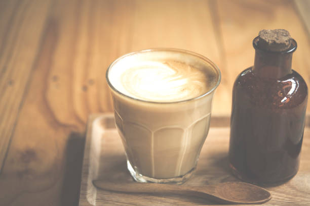istock vintage art filter image of coffee latte art in cafe 657565392