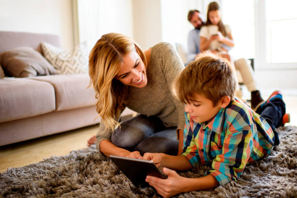 istock Mother and son with digital tablet 657566416