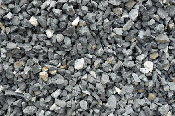 istock aggregate of coarse gray stones, crushed at a stone pit, gravel pattern 657571614