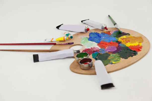 istock Watercolor paints and paint brushes on palette 657572238