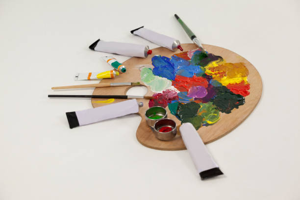 istock Watercolor paints and paint brushes on palette 657572356