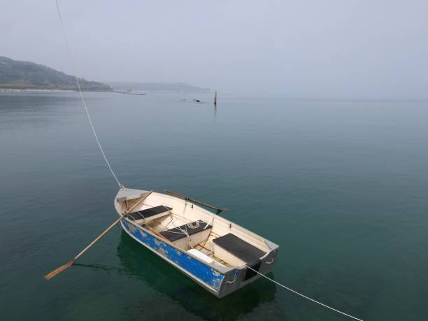 istock boat in foggy sea 657575692