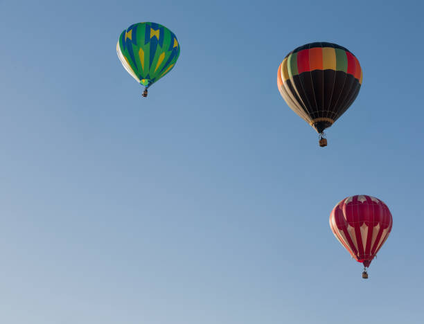 istock Colorful balloons flying through the blue sky. Utah, US 657595504