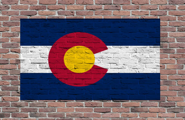 istock Flag of Colorado State painted over brick wall 657599210
