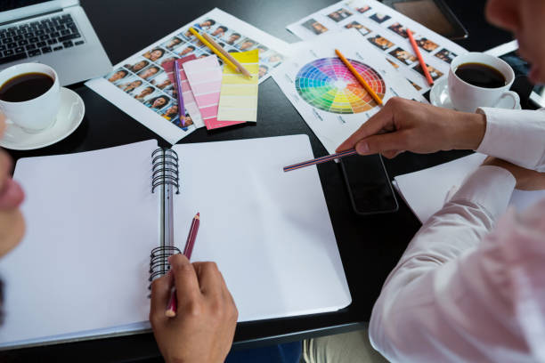 istock Man and woman working in office 657616376