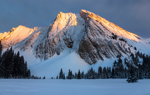Chester Lake Trail is one of most popular in Kananaskis.  In winter it is often done either as cross-country skiing trip, or on snowshoes.  Cliffs of Mt. Chester are specially spectacular under late afternoon light or during sunset