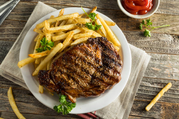 hearty homemade steak and french fries - roast beef beef roasted portion imagens e fotografias de stock