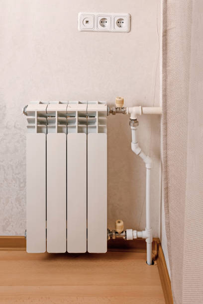 istock Modern hot water radiator on the wall 657636780