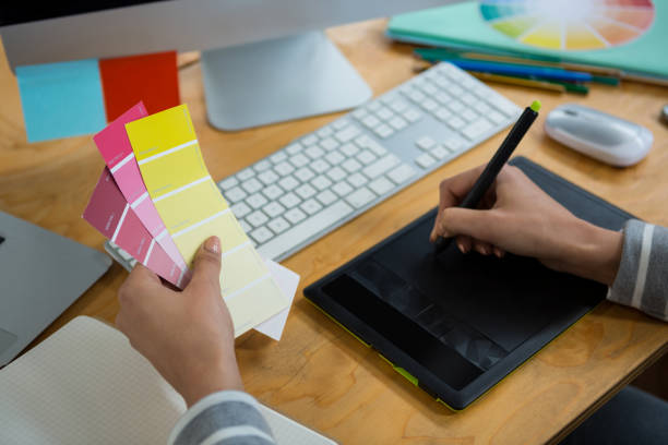 istock Female graphic designer working at desk 657640072