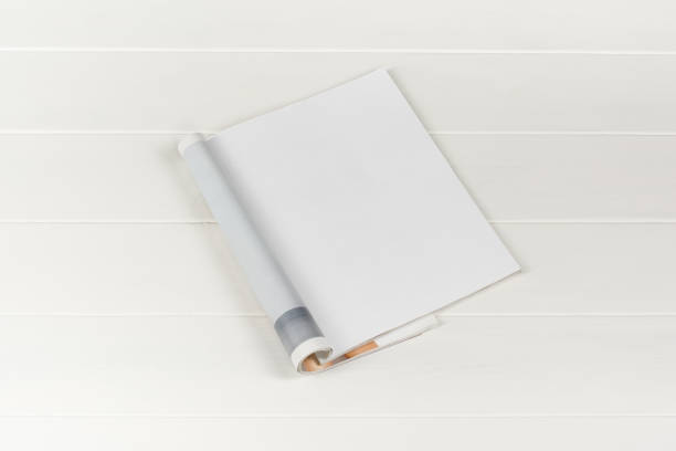 istock Mock-up magazines or catalog on white wooden table background. 657640712
