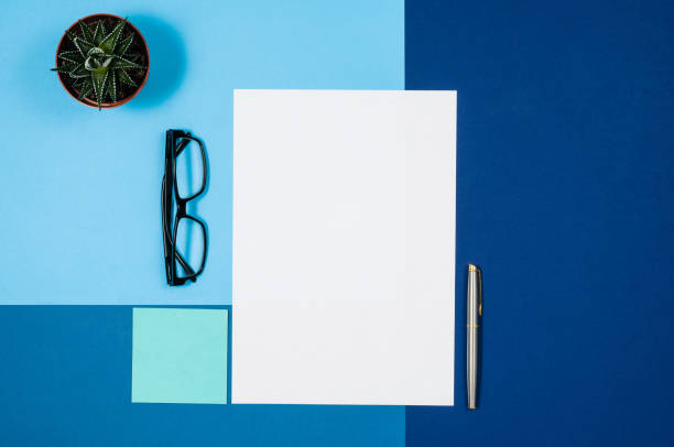 istock Mock-up blank page or magazine on colorful background top view 657643154