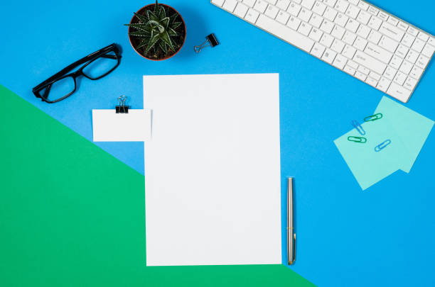 istock Mock-up blank page or magazine on colorful background top view 657643266
