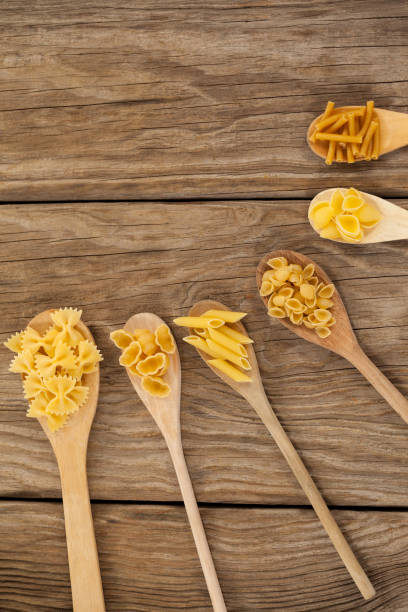 istock Spoons filled with varieties of pasta 657647322